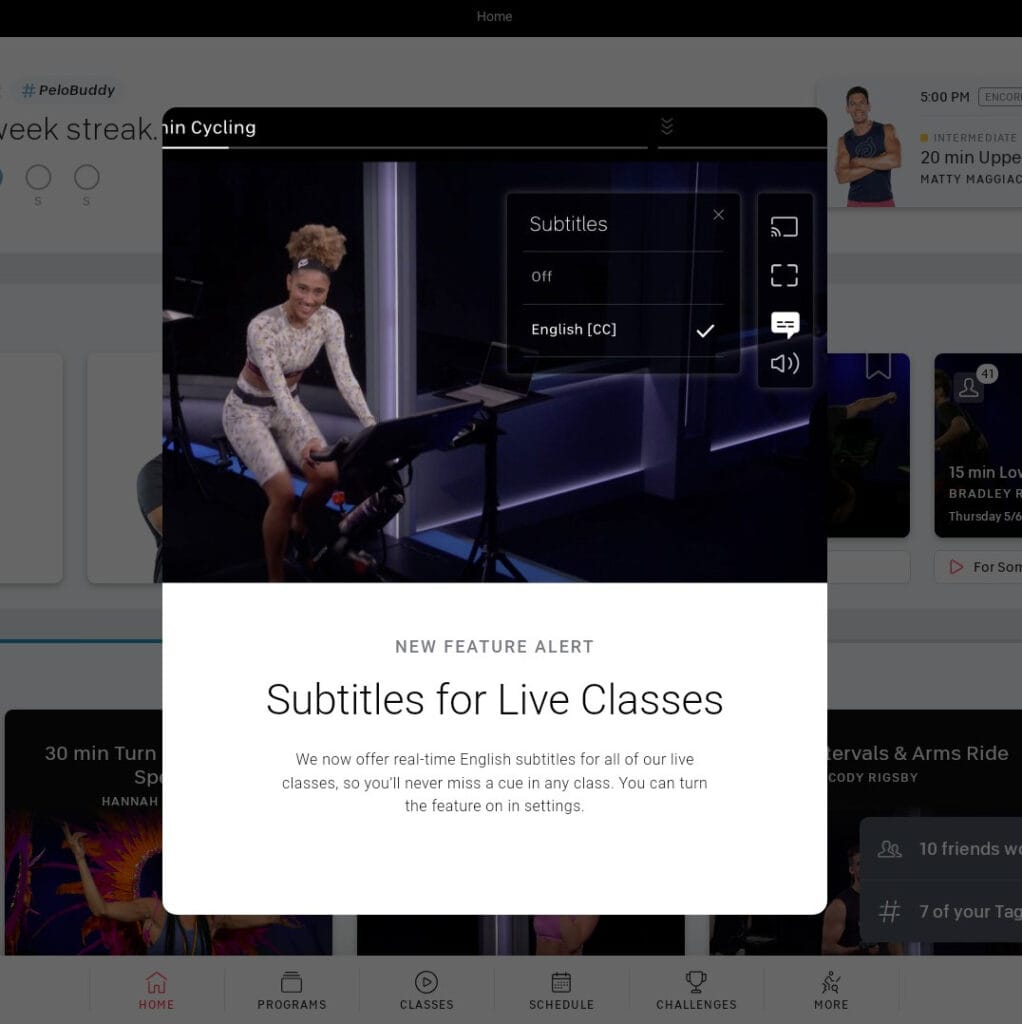 Popup from the Peloton Bike showing feature alert about subtitles for live classes.