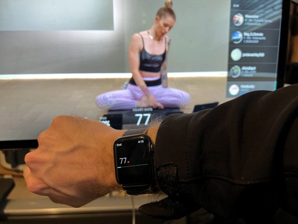 Another shot of the Apple Watch broadcasting heart rate to a class on the Peloton Bike.