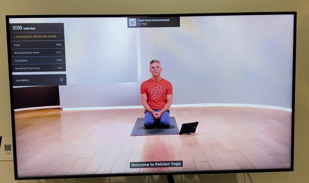 A Yoga class on the Peloton Guide with the detailed class plan being shown.