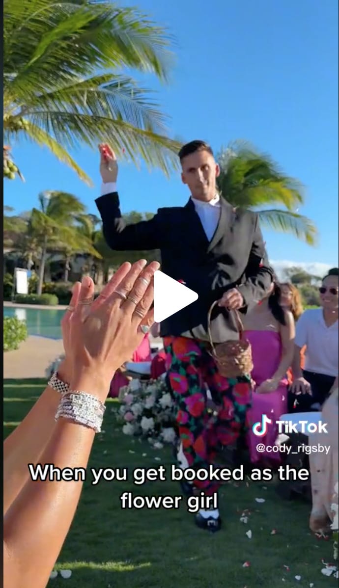 Cody Rigsby as flower girl during Matt Wilpers wedding ceremony. Image credit Cody Rigsby's TikTok account.