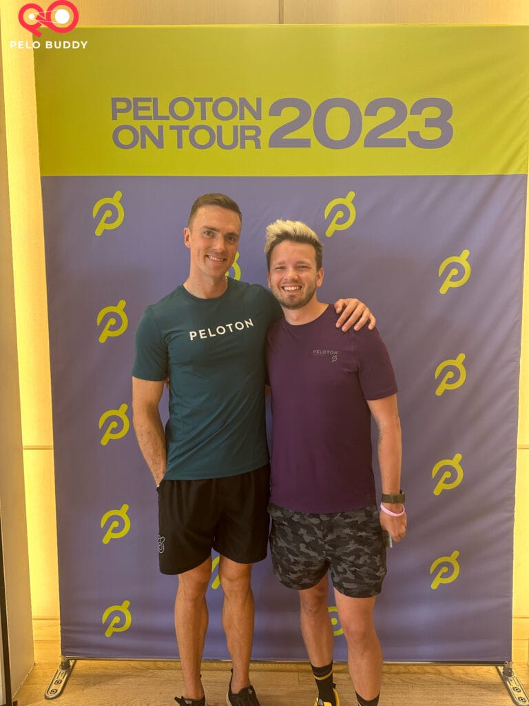 Photo with Peloton Instructor at the Intention Setting station during the Peloton Instructor Experience.