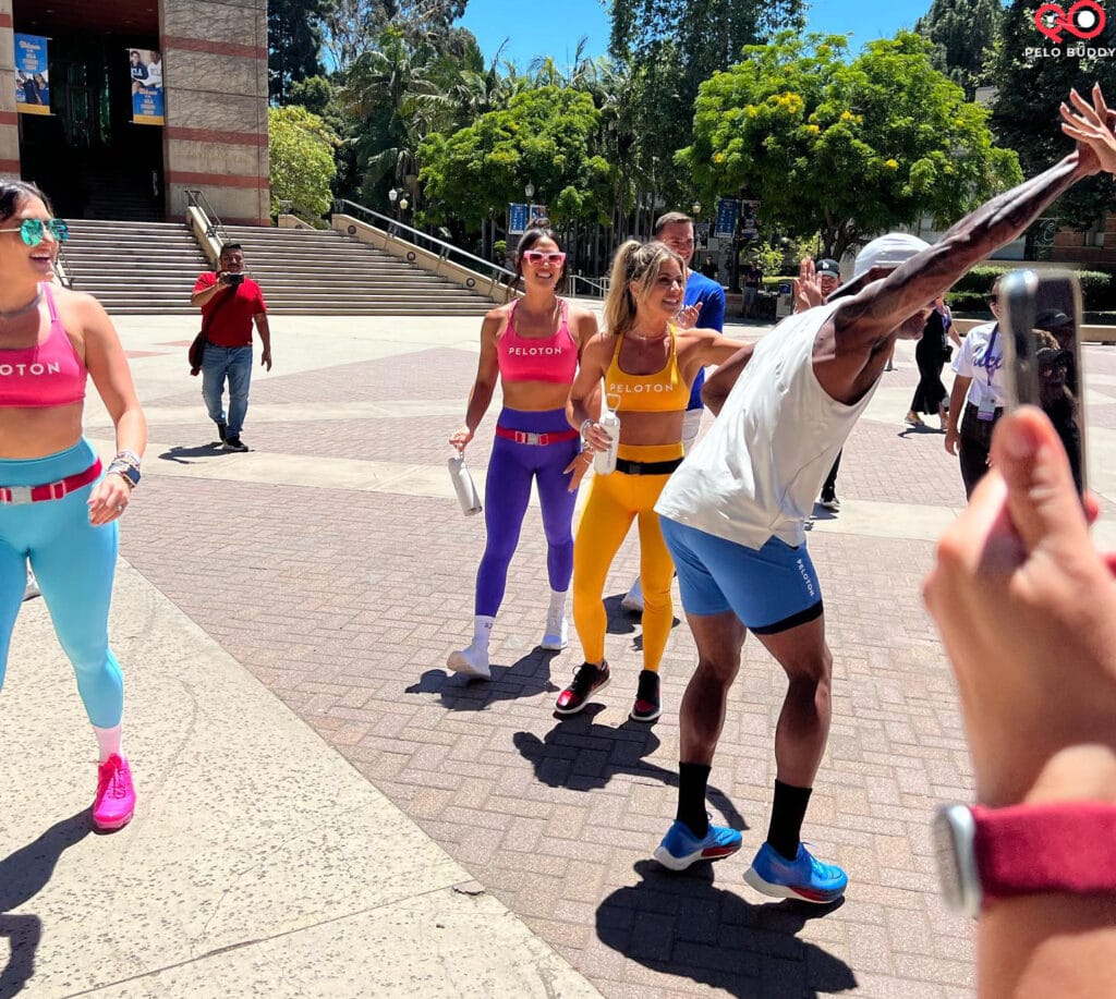 Instructors walking out to lead the group workout at Peloton on Tour.