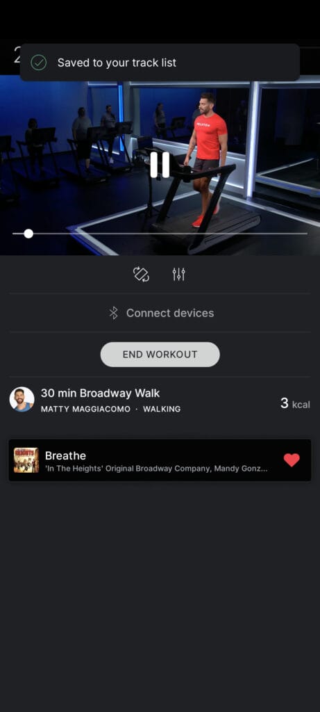 Saving a song to your Peloton playlist during a class with the Peloton app.
